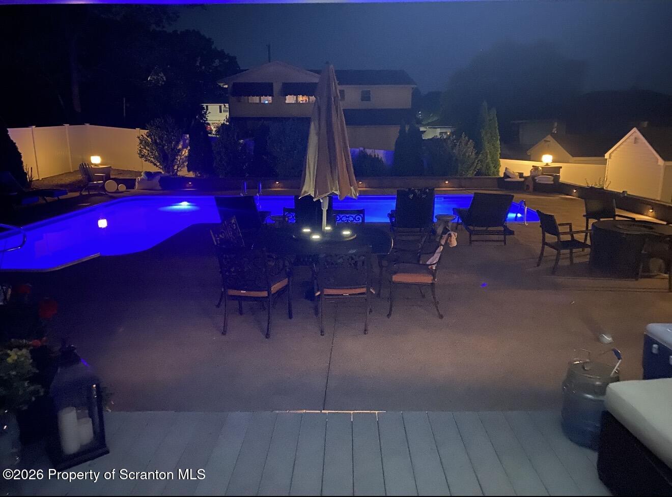 804 School Street Moosic, PA 18507 - Photo 67 of 67 a view of a patio with table and chairs and potted plants