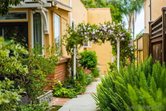 a view of a house with a tree