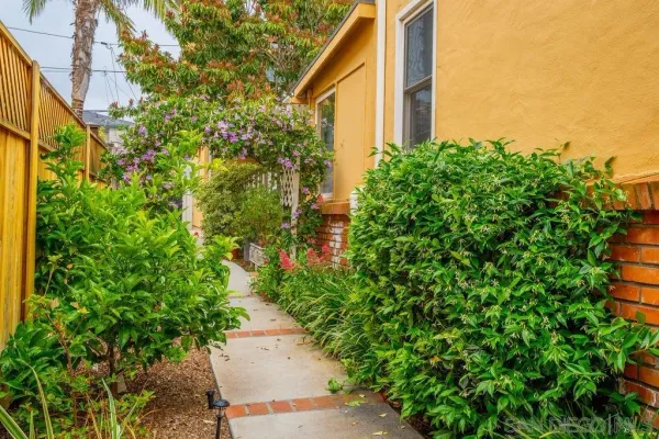 a backyard of a house with lots of green space