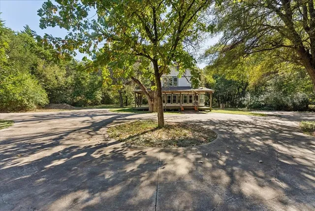 a view of a street with houses