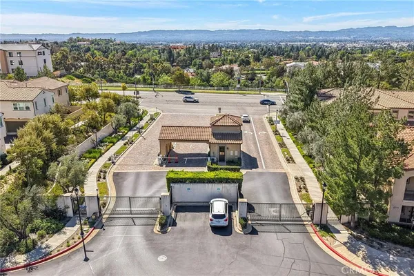 an aerial view of a house with a garden space