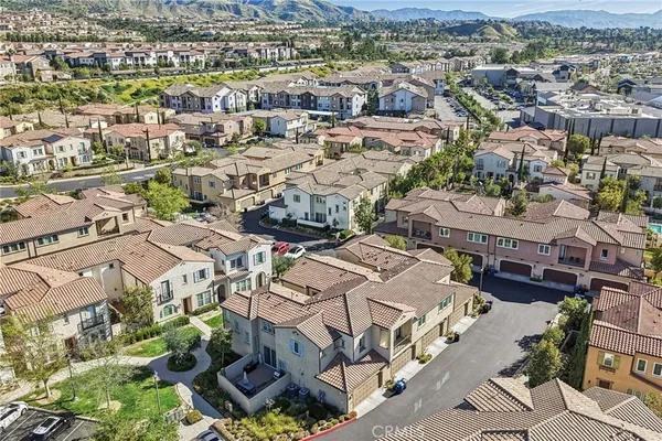 an aerial view of a city with lots of residential buildings