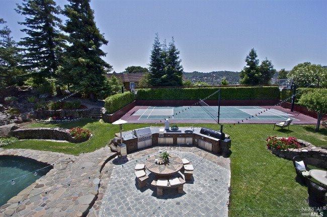 56 Park Ridge Road San Rafael, CA 94903 - Photo 1 of 1 a view of a backyard with sitting area