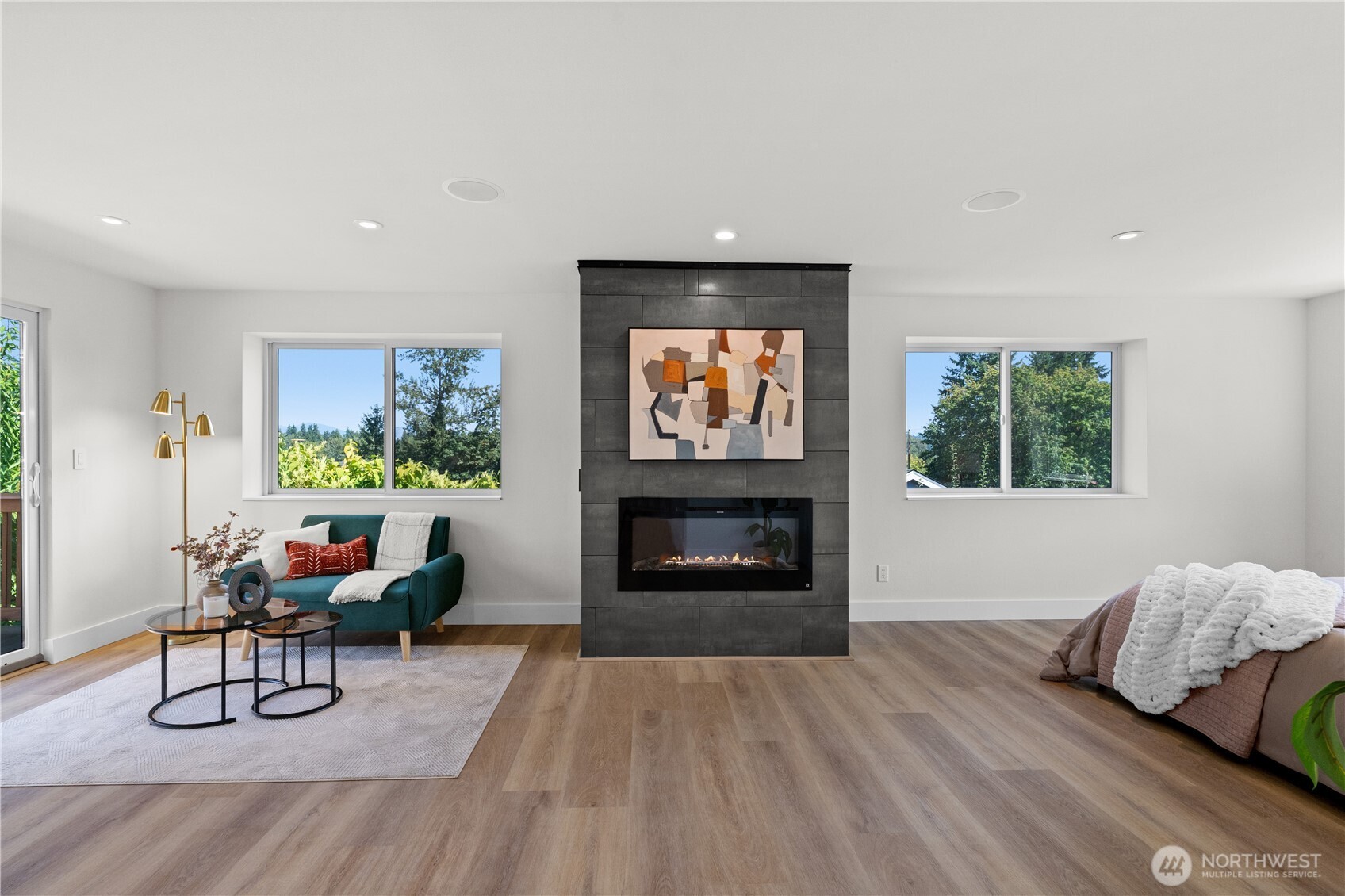 12208 Southeast 192nd Street Renton, WA 98058 - Photo 15 of 40 a living room with furniture and a fireplace