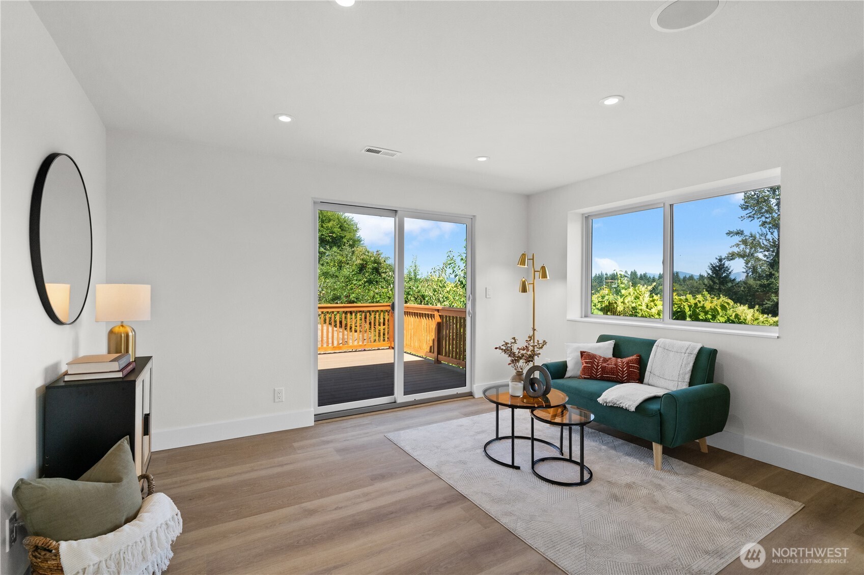 12208 Southeast 192nd Street Renton, WA 98058 - Photo 18 of 40 a living room with furniture a window and a potted plant