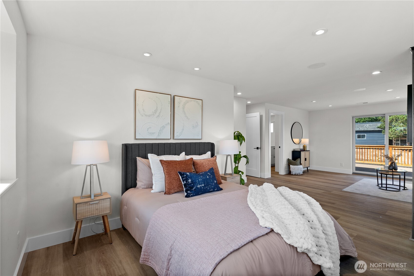 12208 Southeast 192nd Street Renton, WA 98058 - Photo 19 of 40 a bed room with a bed and table chair