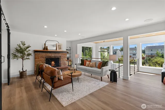 a living room with furniture and a table