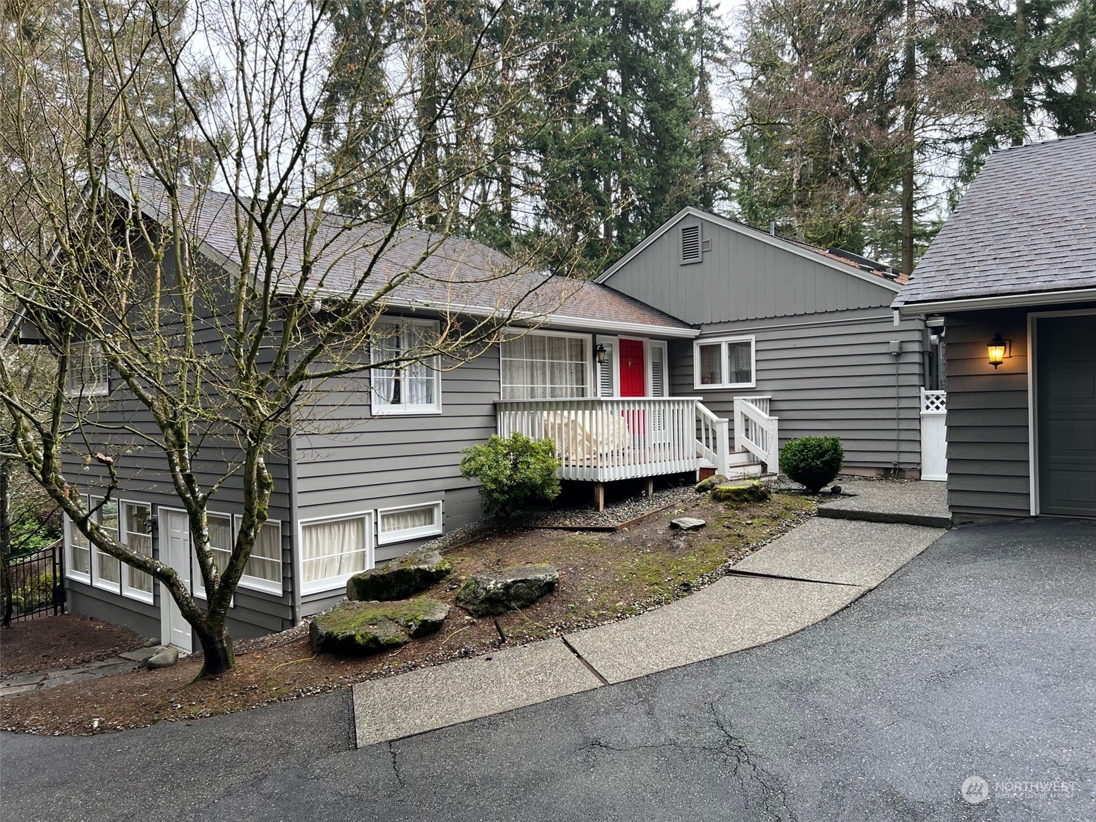 7023 East Mercer Way Mercer Island, WA 98040 - Photo 1 of 1 a view of a house with a patio