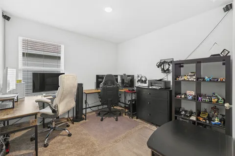 a view of a workspace with furniture