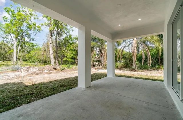 a view of a room with yard and balcony