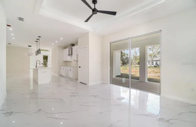 a view of an empty room with a glass door