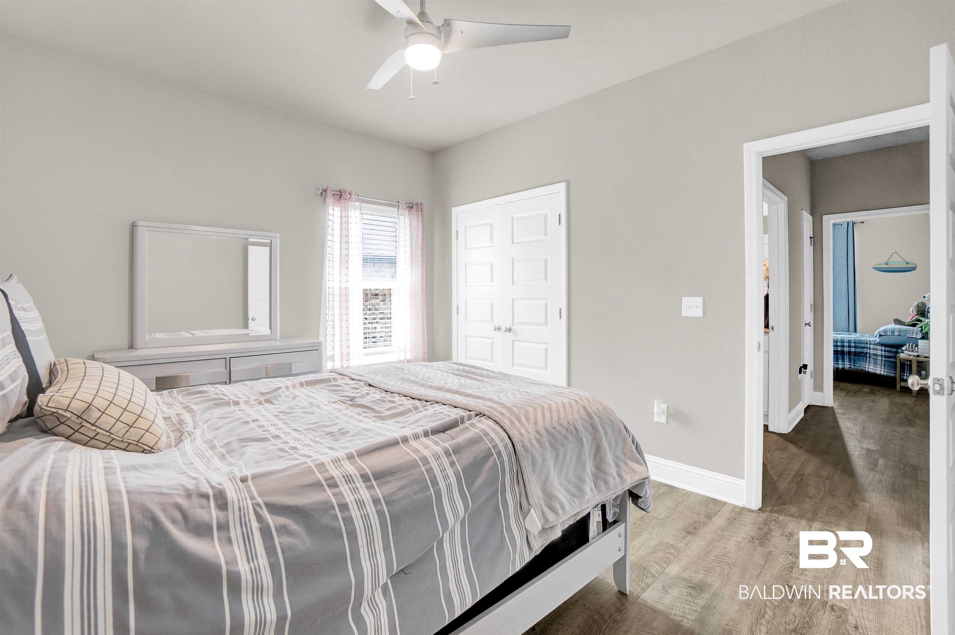 31671 Memphis Loop Daphne, AL 36527 - Photo 9 of 51 Bedroom with baseboards, ceiling fan, and wood finished floors