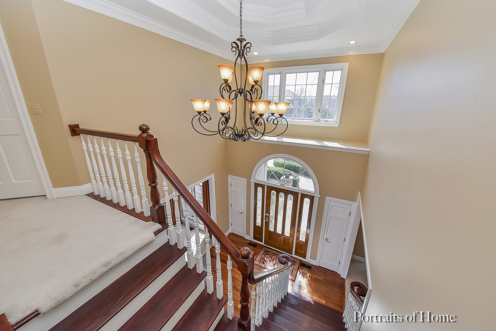 2731 Wendy Road Naperville, IL 60565 - Photo 14 of 31 a view of a dining room with wooden floor and chandelier