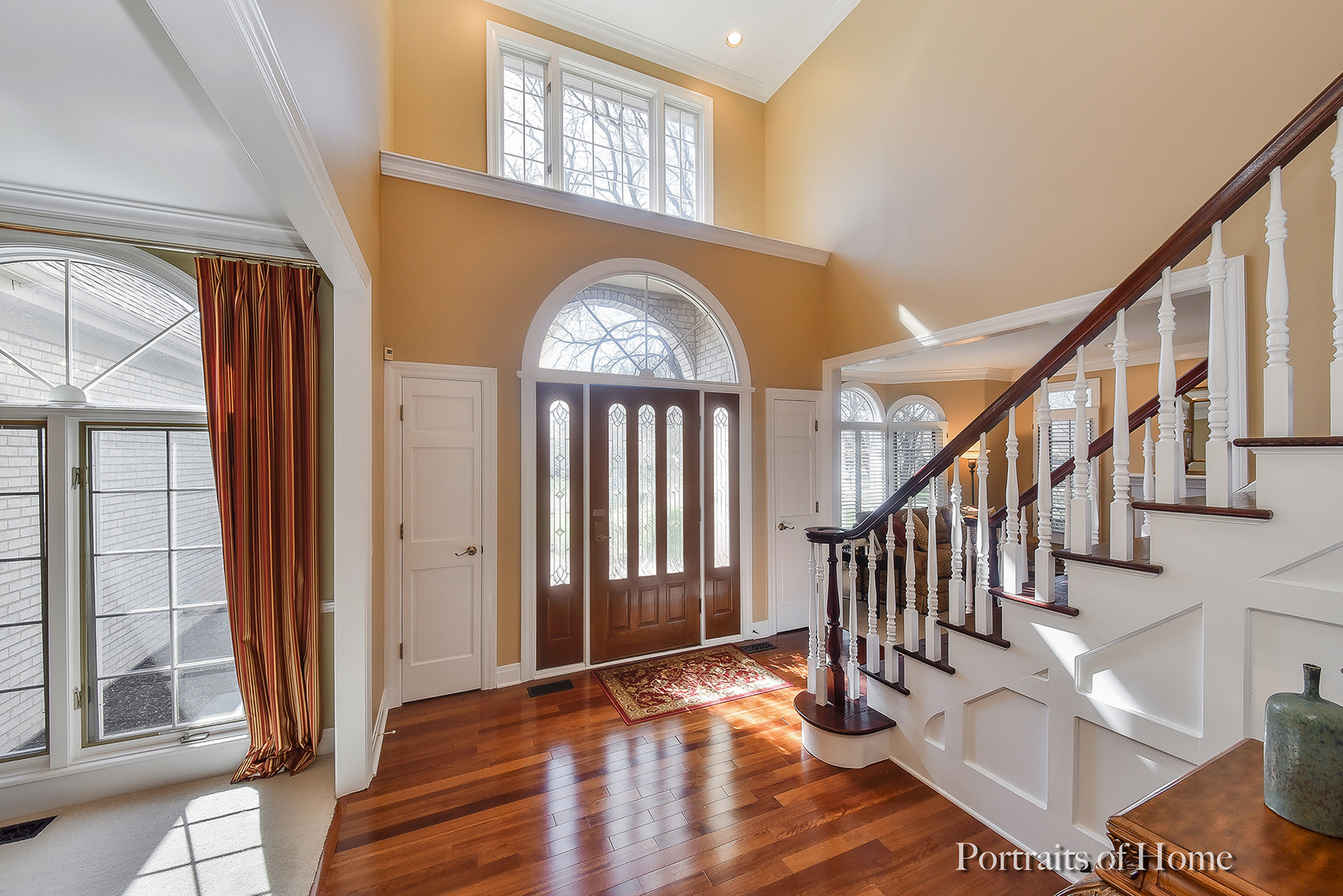 2731 Wendy Road Naperville, IL 60565 - Photo 3 of 31 a view of entryway and hall with wooden floor