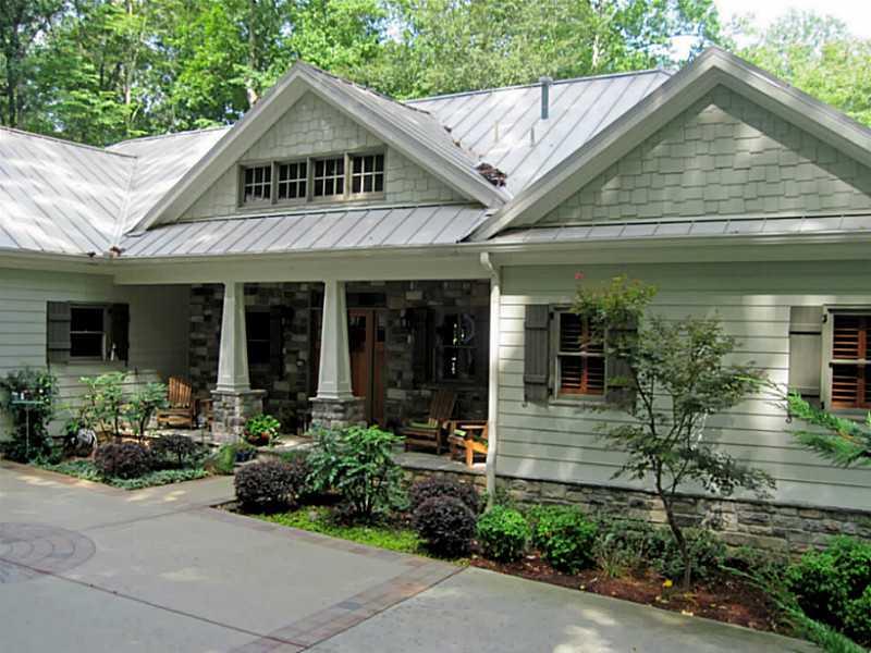 Exterior Front. AMAZING Custom craftsman style ranch with beautiful and inviting flagstone front porch.  This home features nearly 3000 square feet on the main level, with 4 bedrooms, or 3 bedrooms with den on the main.