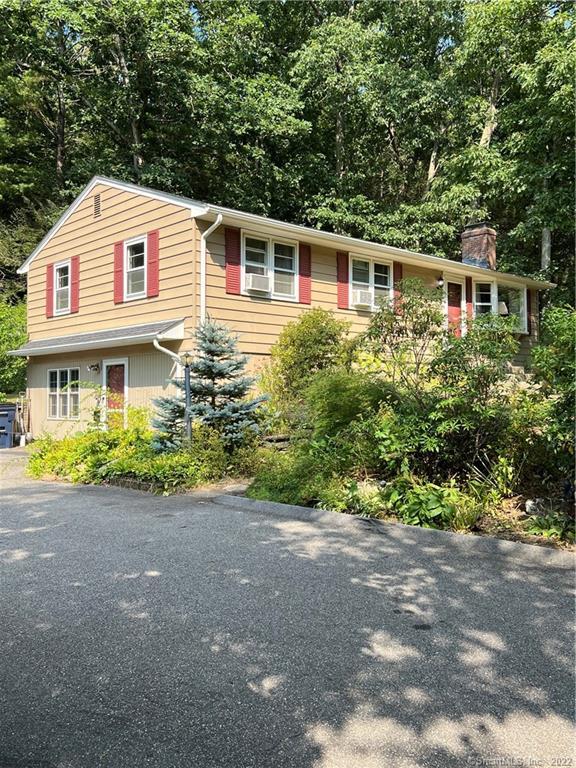 62 Pinney Hill Road Willington, CT 06279 - Photo 1 of 1 a front view of a house with a garden