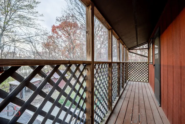 a bathroom with a sink a toilet and shower curtain