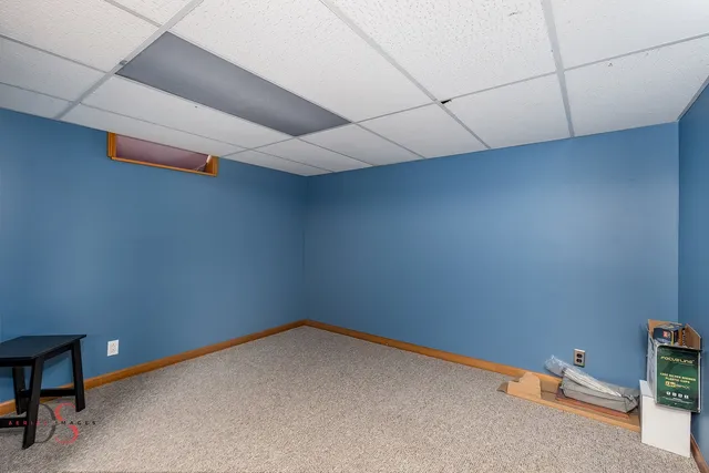 a view of a workspace with furniture