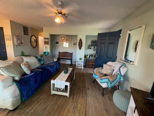 a view of a living room and dining room
