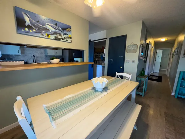 a view of an empty room with a fireplace