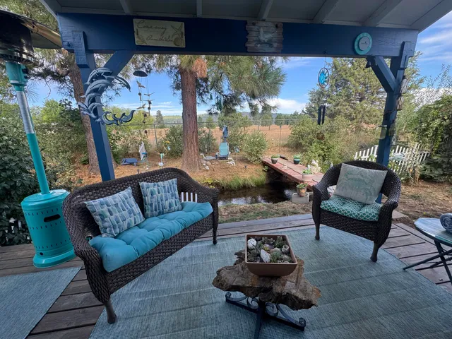 a outdoor living space with furniture and a potted plant