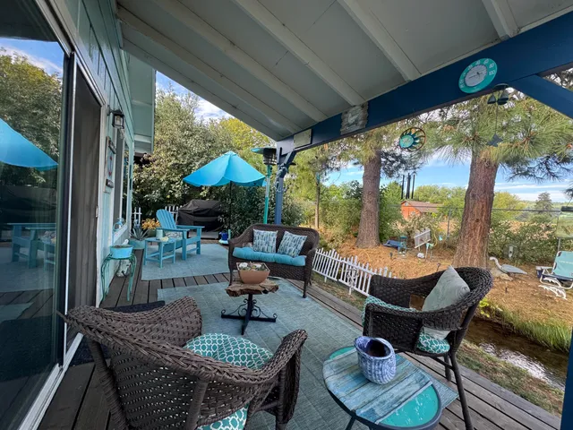 a outdoor living space with furniture and garden view