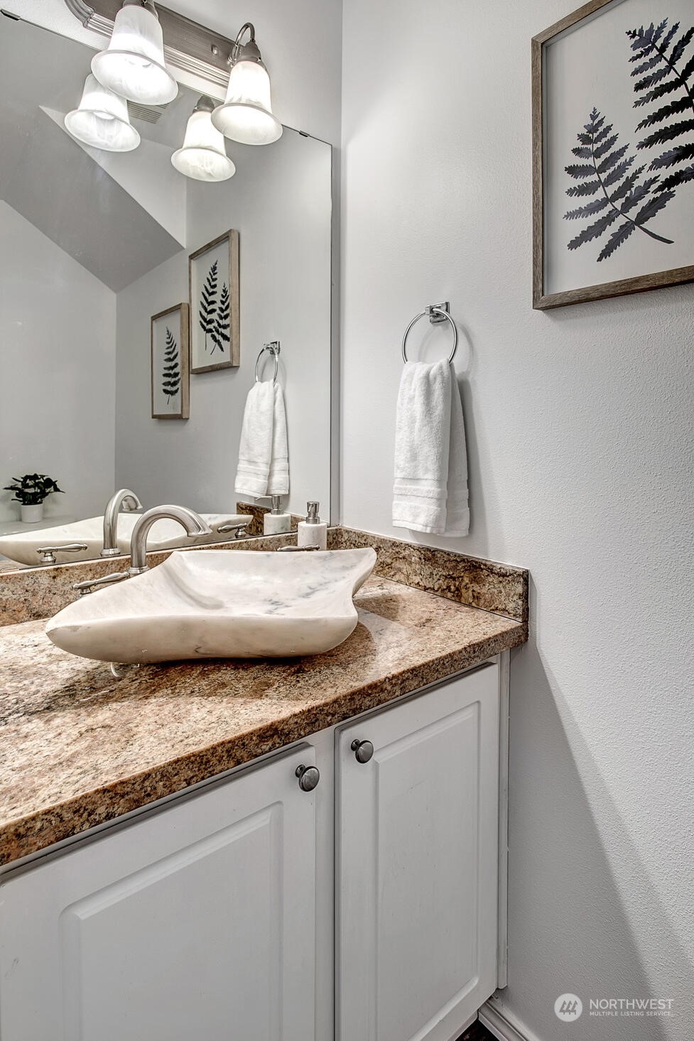 453 Field Place Northeast Renton, WA 98059 - Photo 13 of 36 a bathroom with a granite countertop sink and a mirror