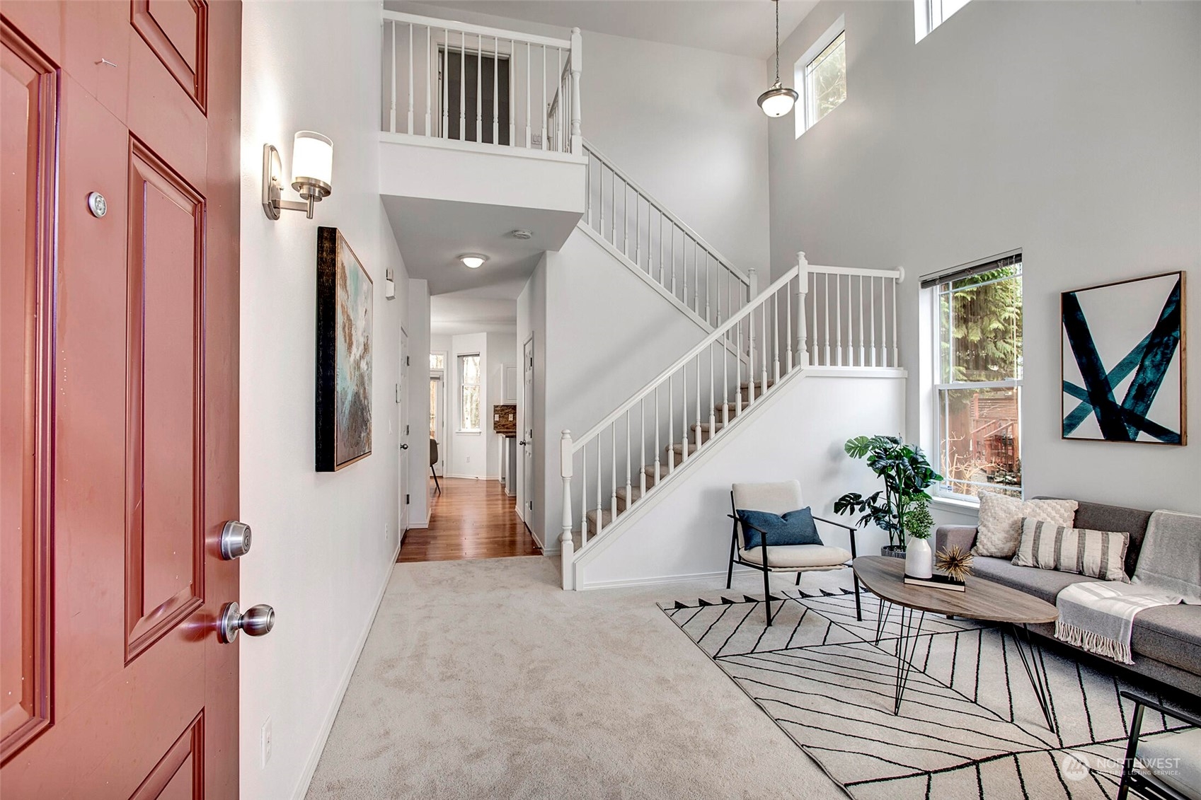 453 Field Place Northeast Renton, WA 98059 - Photo 2 of 36 a view of entryway and hall with wooden floor