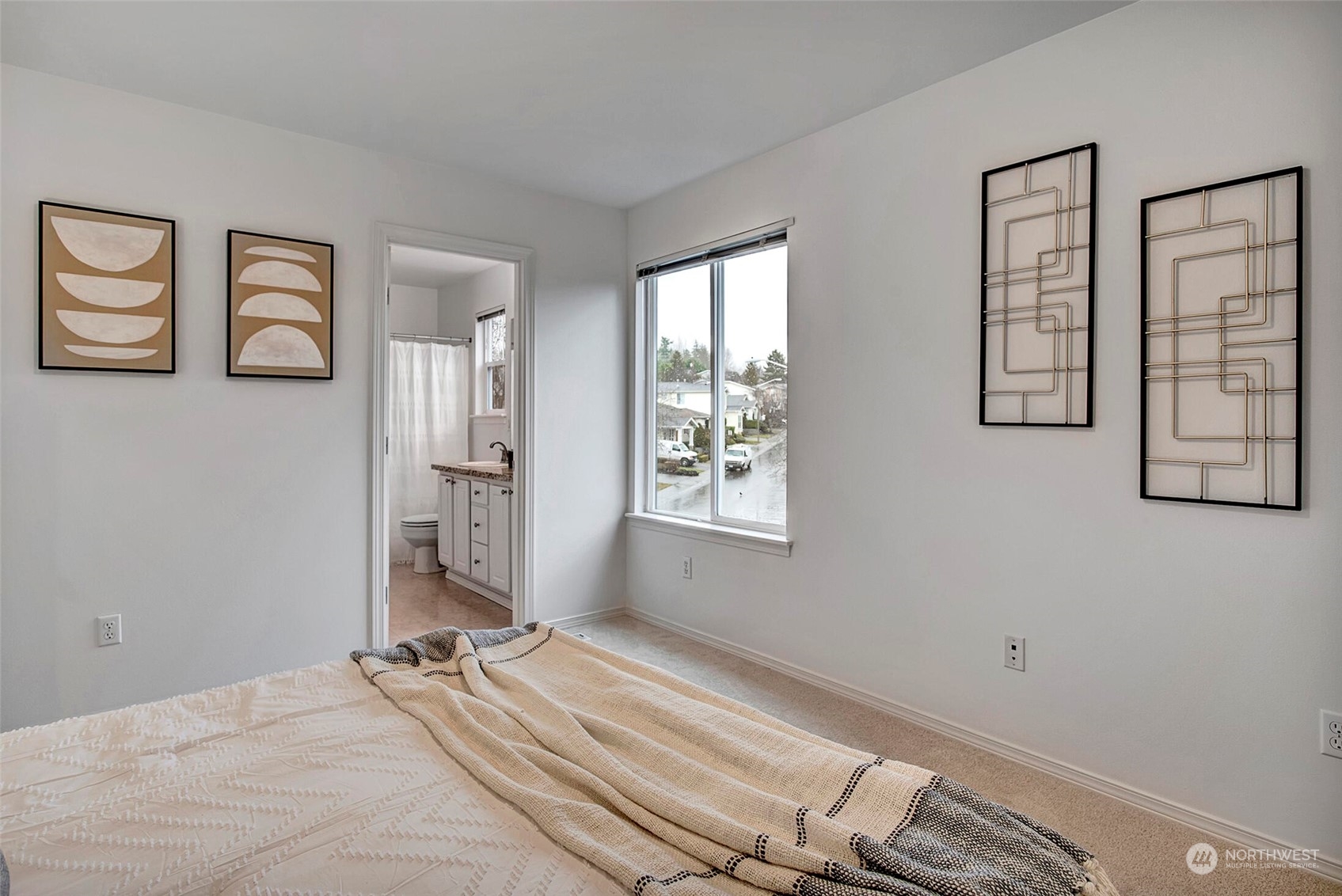 453 Field Place Northeast Renton, WA 98059 - Photo 23 of 36 a view of a bedroom with bed and a window