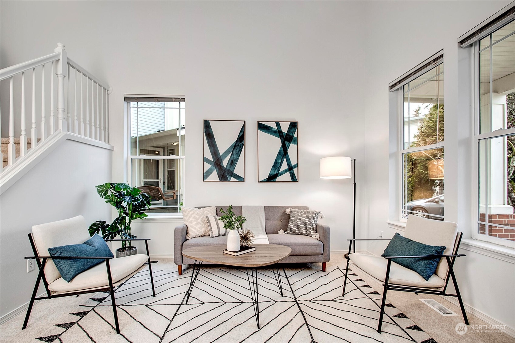 453 Field Place Northeast Renton, WA 98059 - Photo 28 of 36 a living room with furniture and a potted plant
