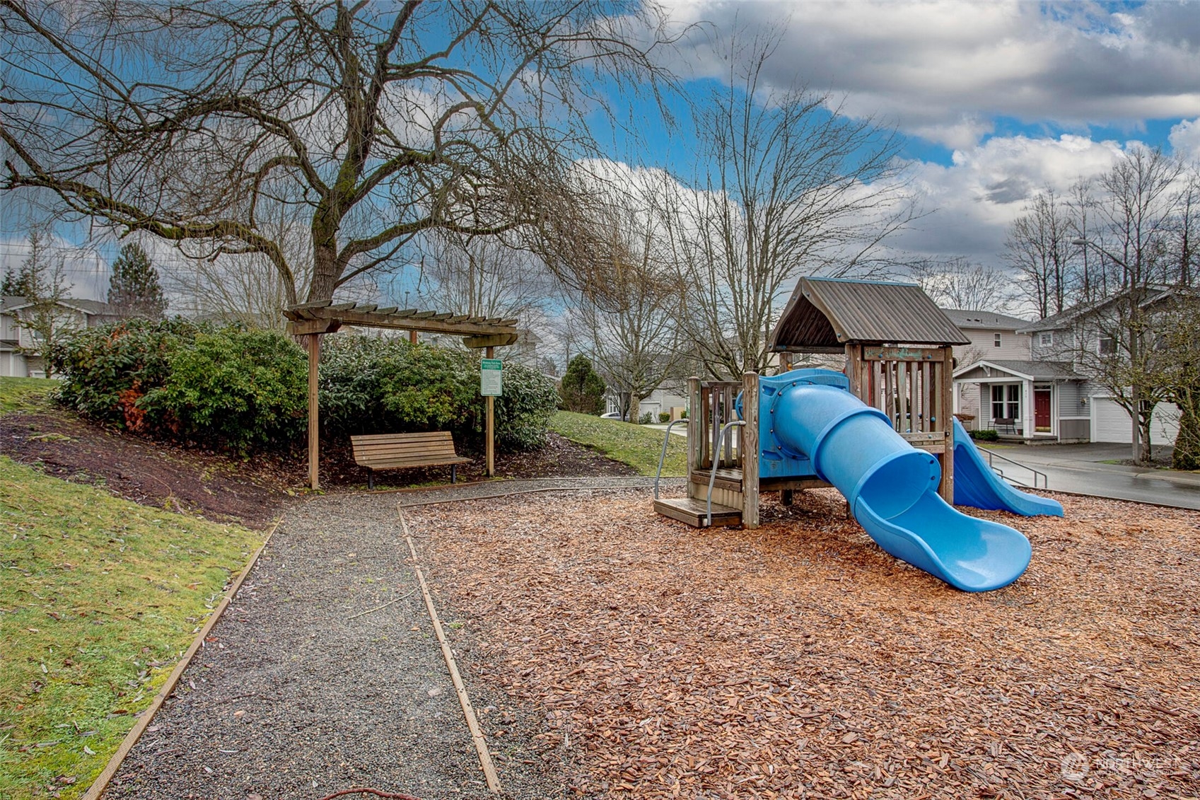 453 Field Place Northeast Renton, WA 98059 - Photo 31 of 36 a view of a backyard with furniture and a fire pit