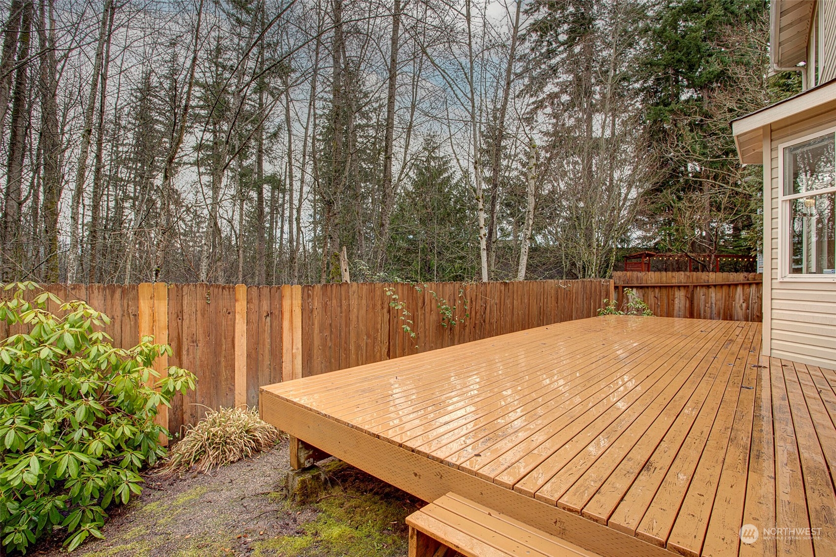 453 Field Place Northeast Renton, WA 98059 - Photo 9 of 36 a view of backyard with a garden and seating area