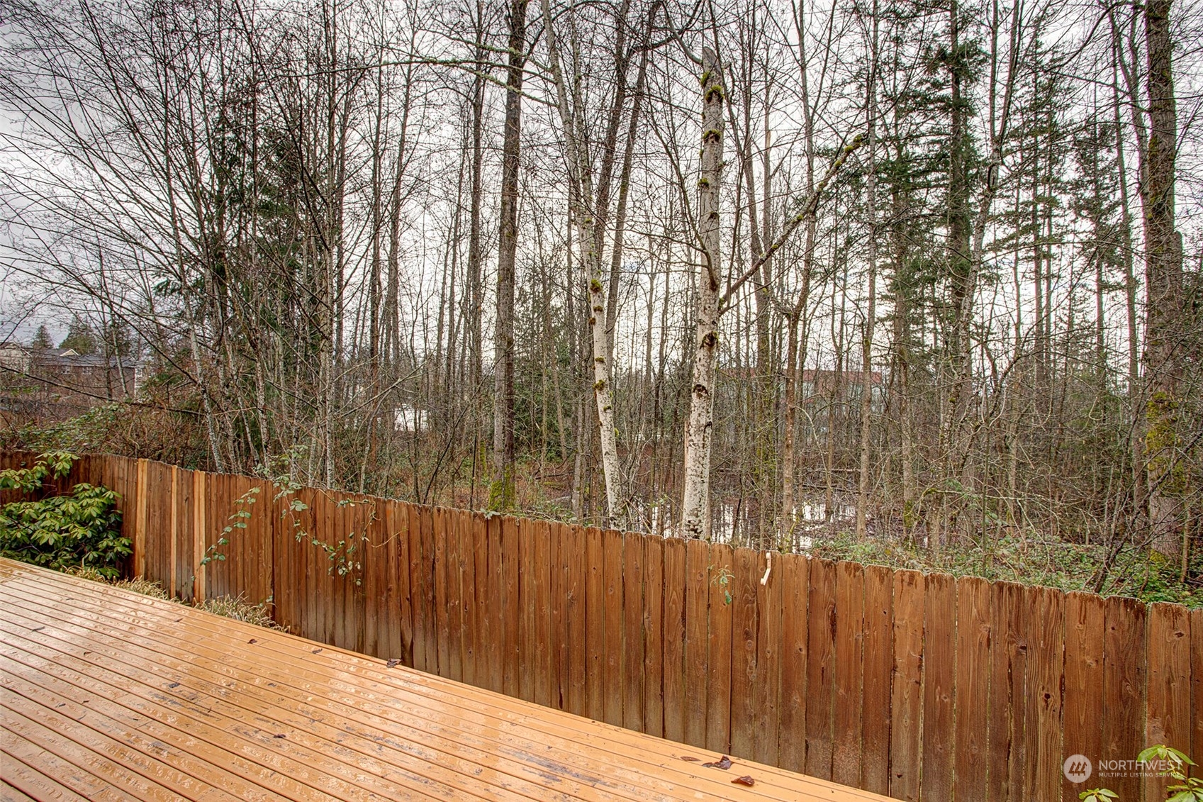 453 Field Place Northeast Renton, WA 98059 - Photo 10 of 36 a view of balcony with wooden floor and fence