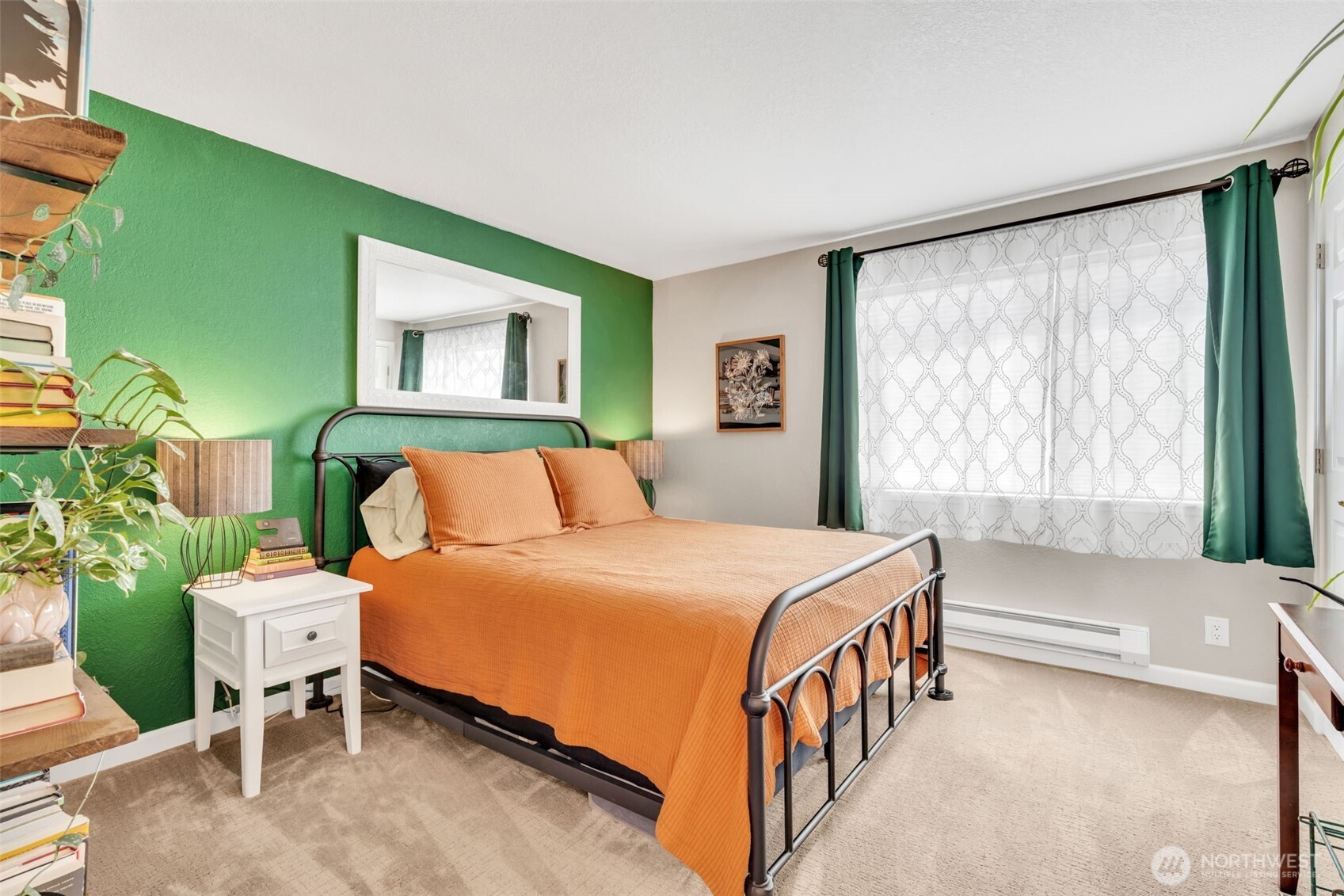 4231 Northeast 5th Street, Unit E101 Renton, WA 98059 - Photo 3 of 29 a bedroom with a bed and a window