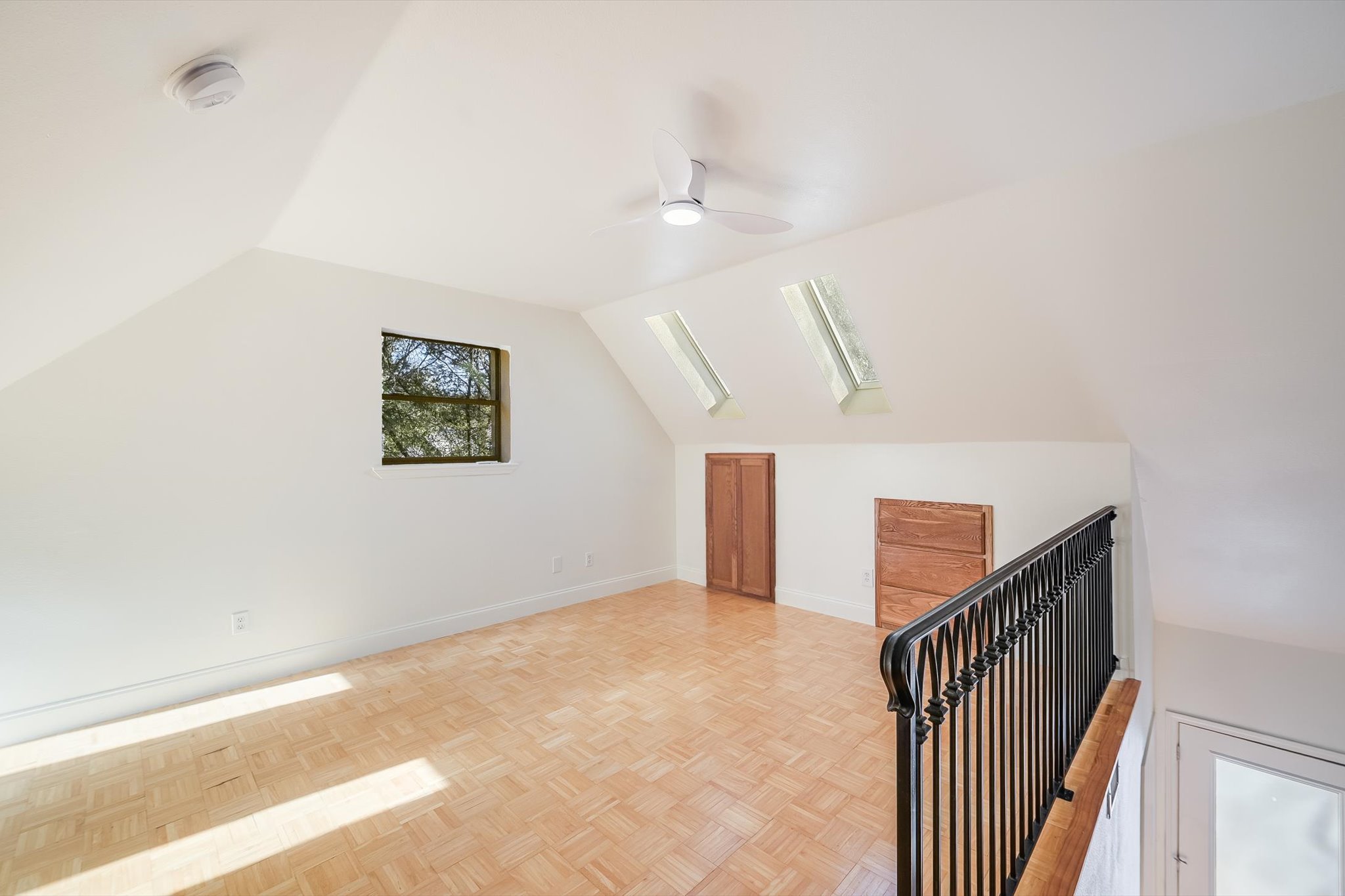 302 Lago Verde Road Lakeway, TX 78734 - Photo 10 of 21 Additional living space featuring vaulted ceiling and ceiling fan