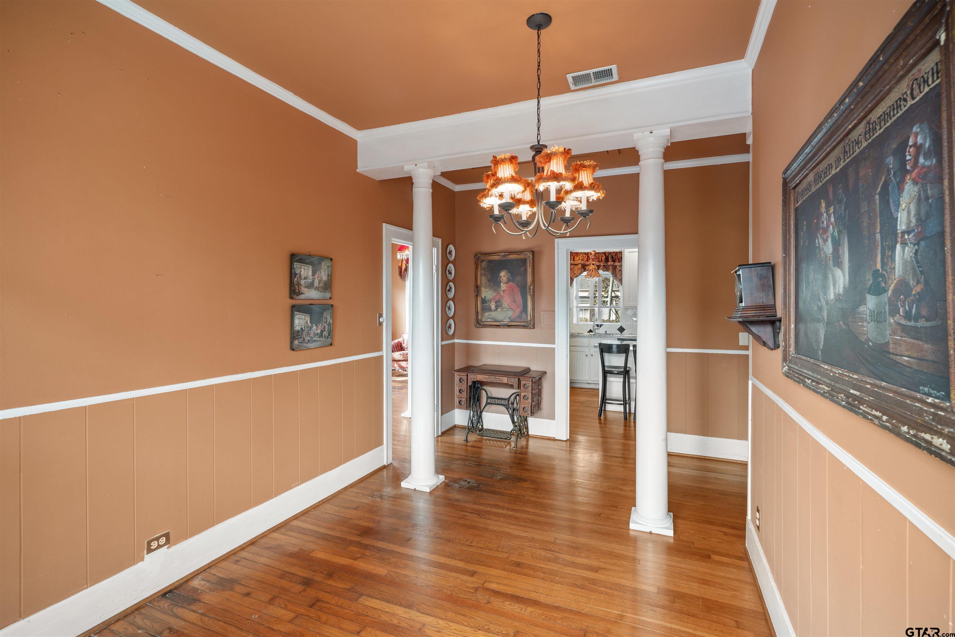 315 Mockingbird Lane Tyler, TX 75701 - Photo 18 of 33 a view of a dining room with furniture wooden floor and chandelier