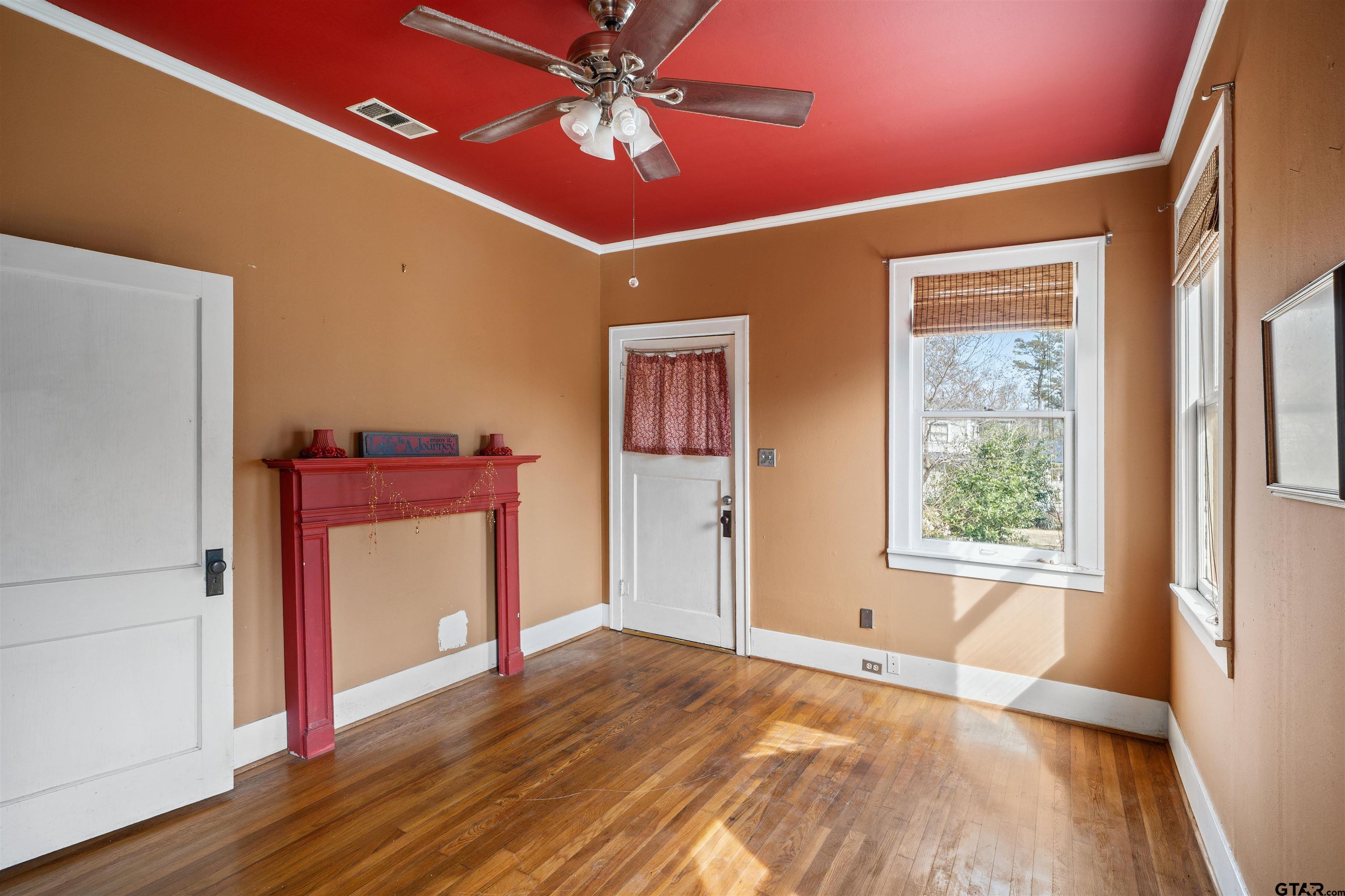315 Mockingbird Lane Tyler, TX 75701 - Photo 23 of 33 a view of empty room with wooden floor