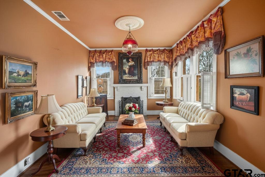 315 Mockingbird Lane Tyler, TX 75701 - Photo 4 of 33 a living room with furniture fireplace and flat screen tv
