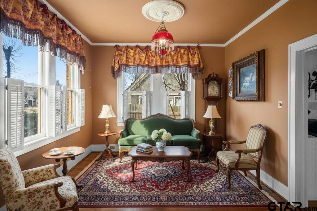 315 Mockingbird Lane Tyler, TX 75701 - Photo 7 of 33 a living room filled with furniture and a chandelier