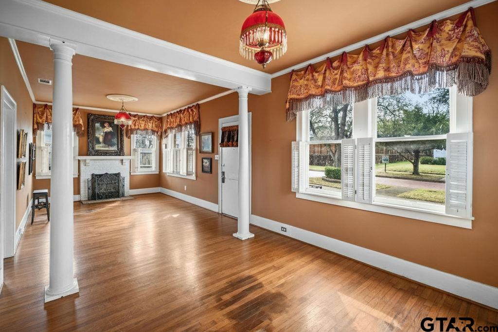 315 Mockingbird Lane Tyler, TX 75701 - Photo 9 of 33 a view of a room with wooden floor and windows