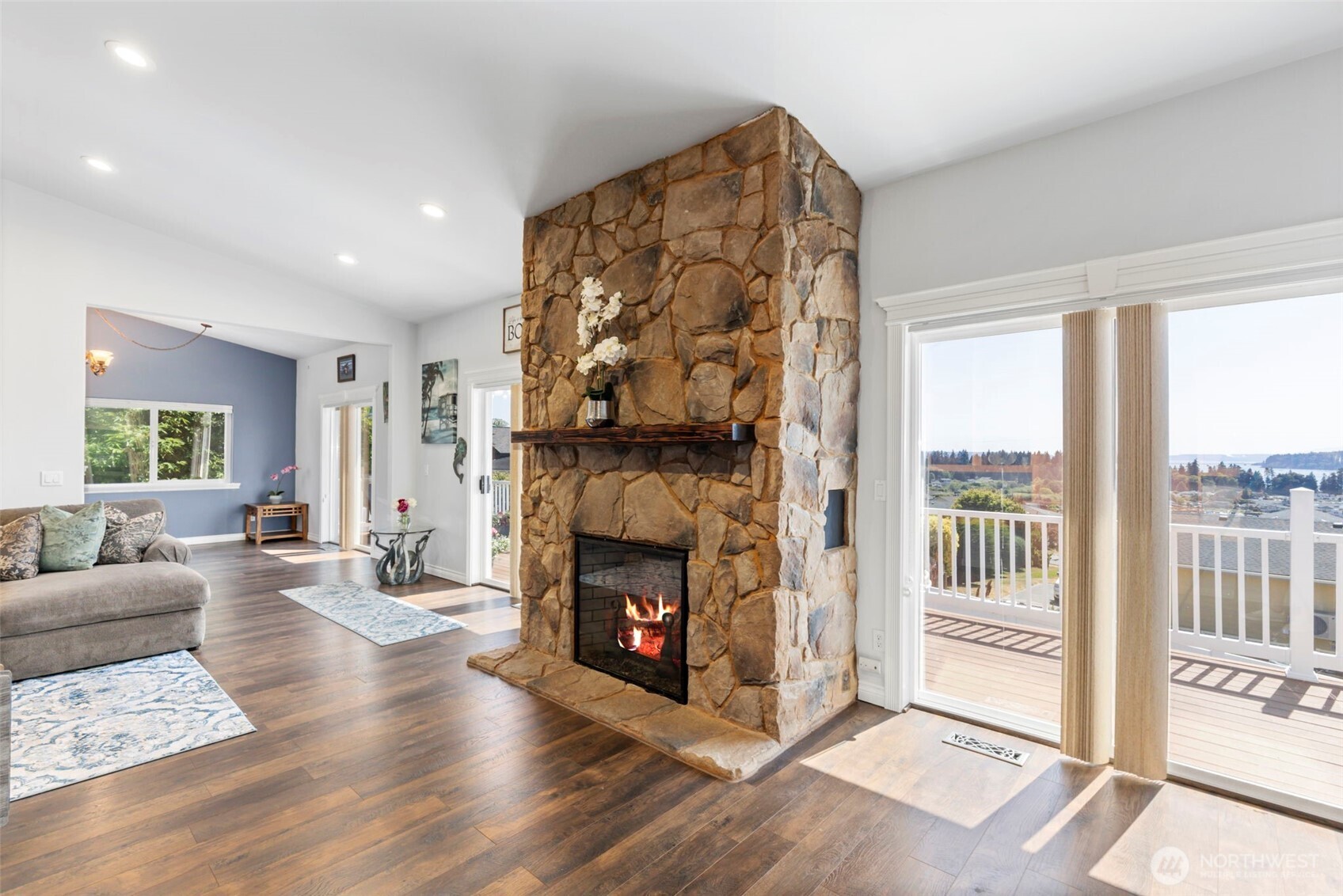 38292 Northeast Doe Road Hansville, WA 98340 - Photo 15 of 40 a living room with furniture and a fireplace
