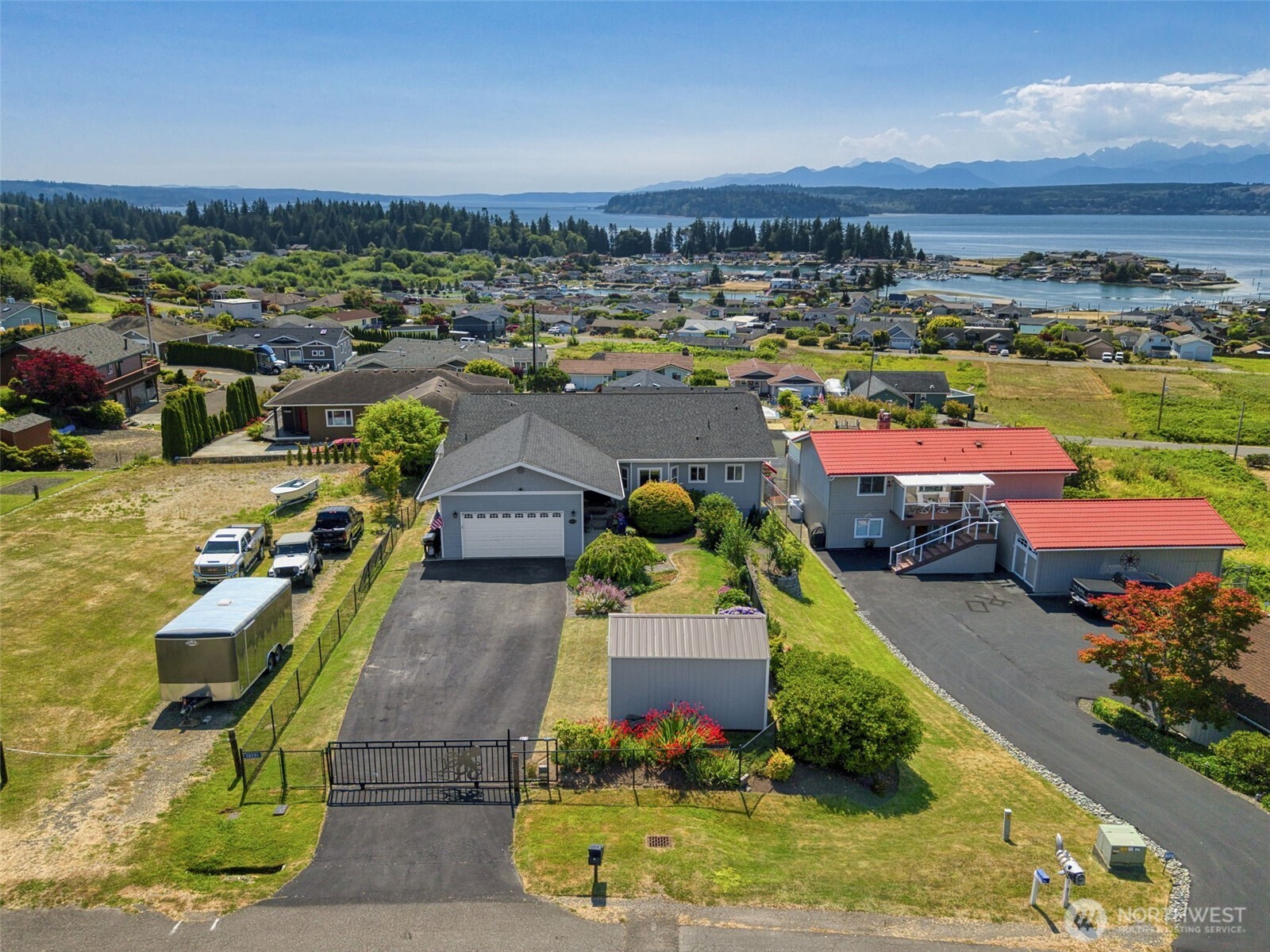 38292 Northeast Doe Road Hansville, WA 98340 - Photo 2 of 40 a view of a swimming pool with a patio
