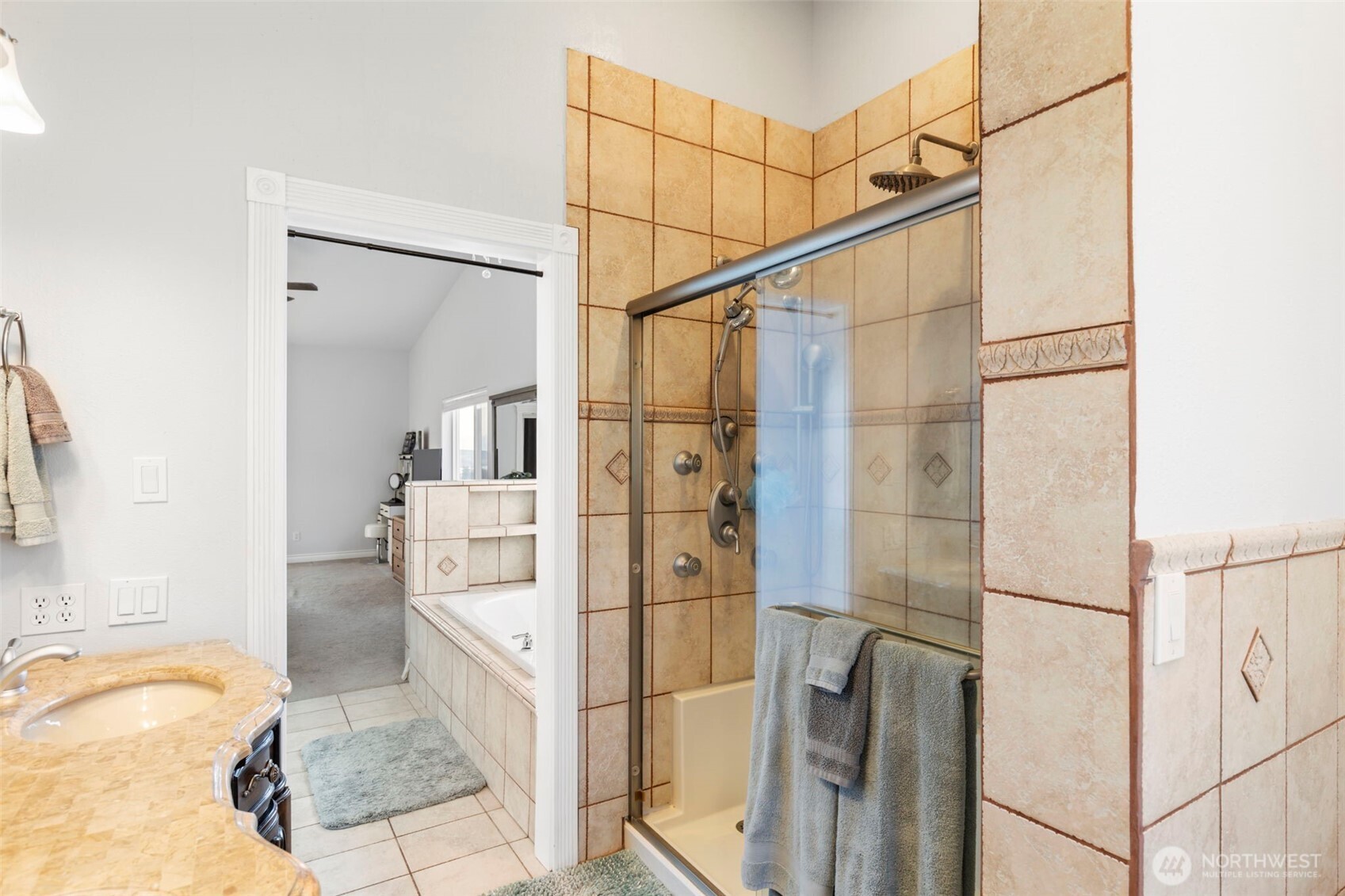 38292 Northeast Doe Road Hansville, WA 98340 - Photo 30 of 40 a bathroom with a tub and shower