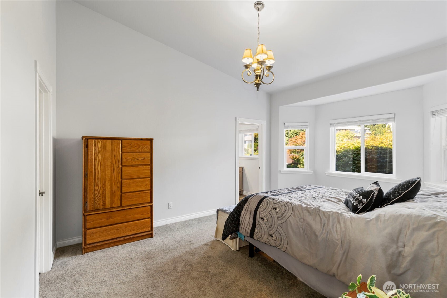 38292 Northeast Doe Road Hansville, WA 98340 - Photo 31 of 40 a bedroom with a bed and a window