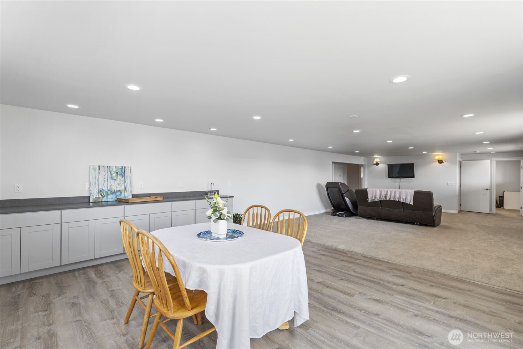 38292 Northeast Doe Road Hansville, WA 98340 - Photo 37 of 40 a view of a dining room with furniture and wooden floor