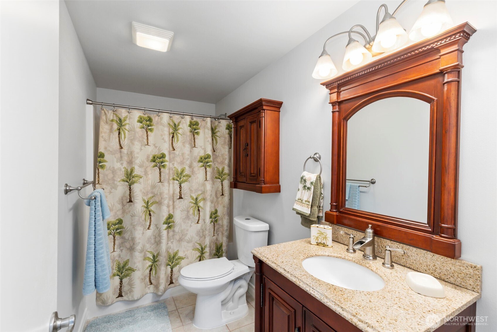38292 Northeast Doe Road Hansville, WA 98340 - Photo 39 of 40 a bathroom with a granite countertop sink toilet and shower