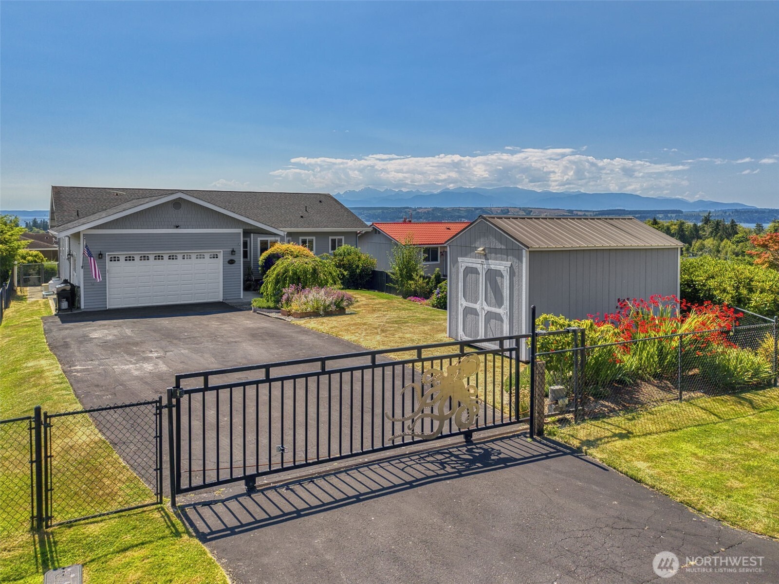 38292 Northeast Doe Road Hansville, WA 98340 - Photo 4 of 40 a view of a terrace with a garden