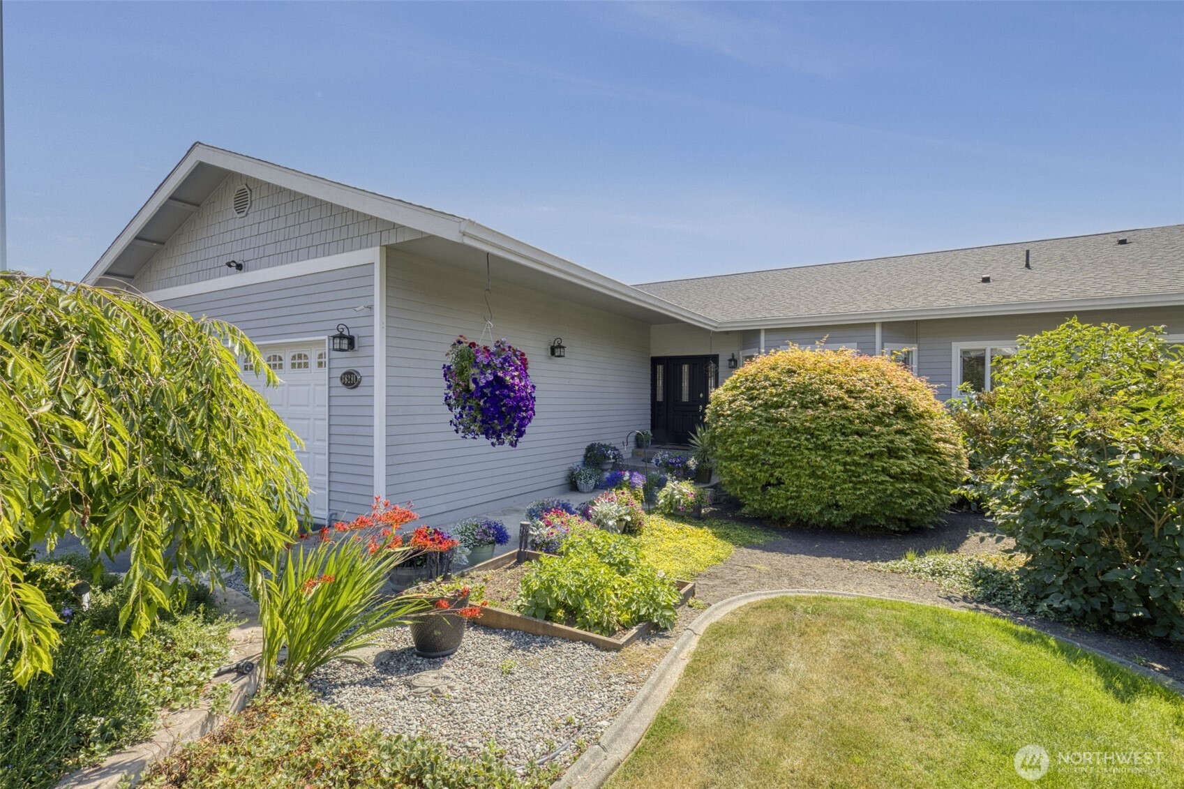 38292 Northeast Doe Road Hansville, WA 98340 - Photo 7 of 40 a front view of a house with garden