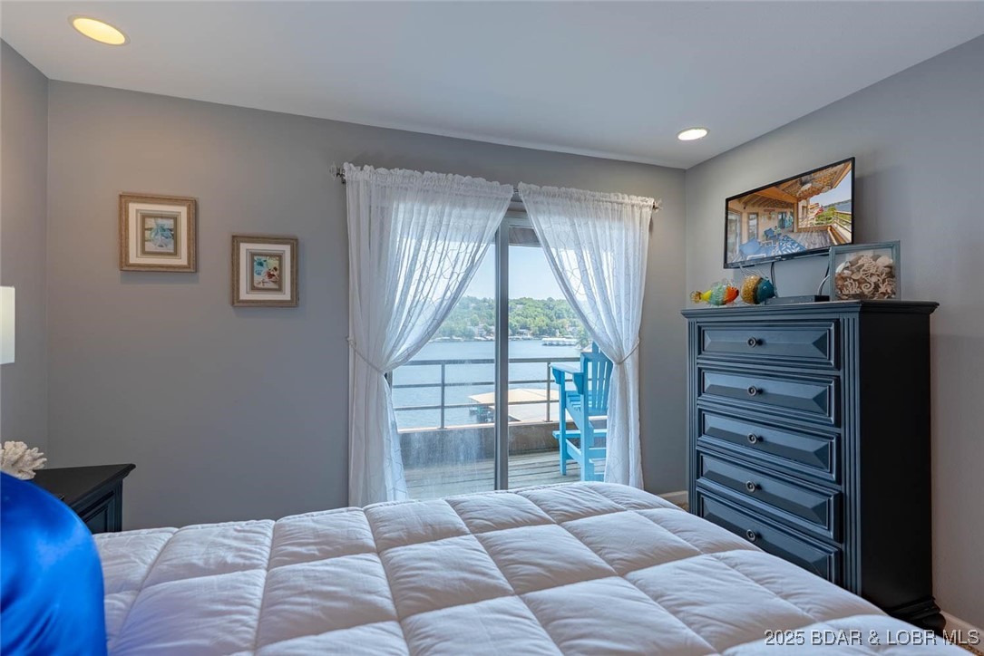 52 Cedar Road, Unit 2A Lake Ozark, MO 65049 - Photo 22 of 48 Walks out to covered deck