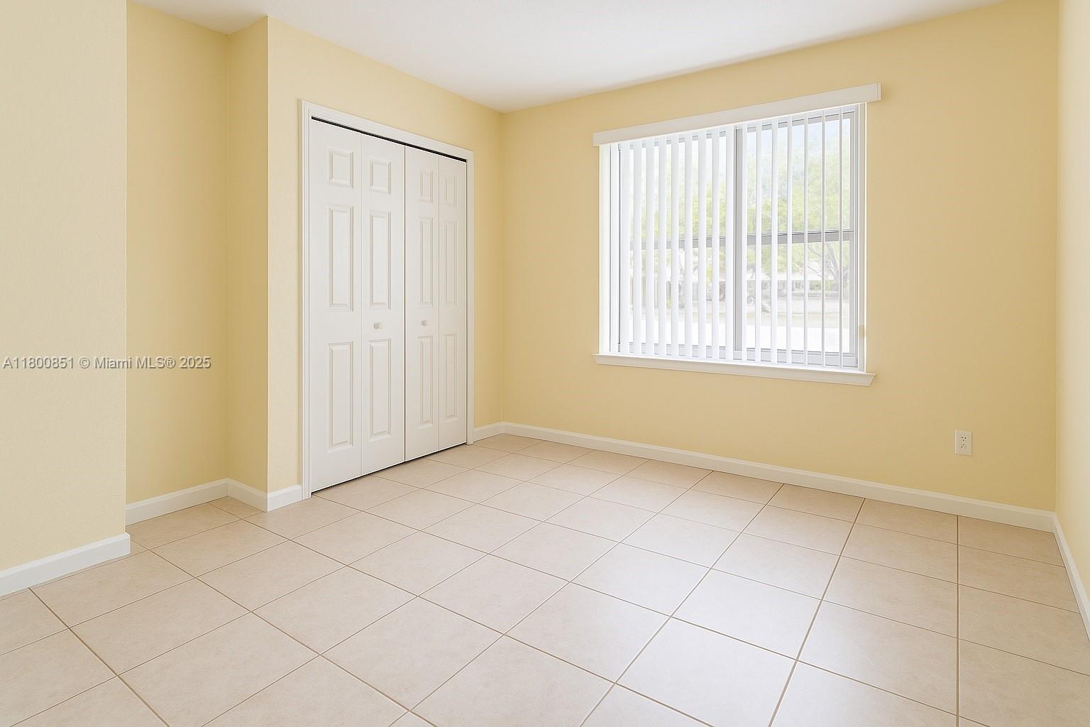 1741 Southwest 17th Court Miami, FL 33145 - Photo 13 of 13 an empty room with windows